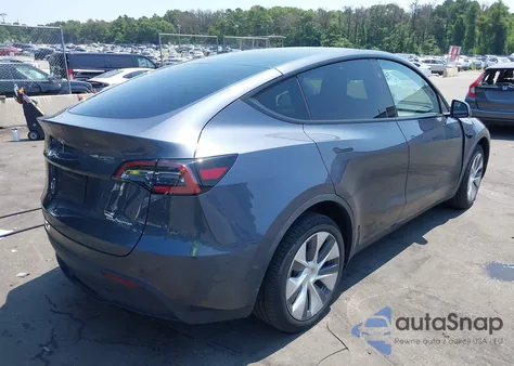 2023 Tesla Model Y Awd/Long Range Dual Motor All-Wheel Drive z USA, uszkodzony, nr VIN 7SAYGDEE3PA183786